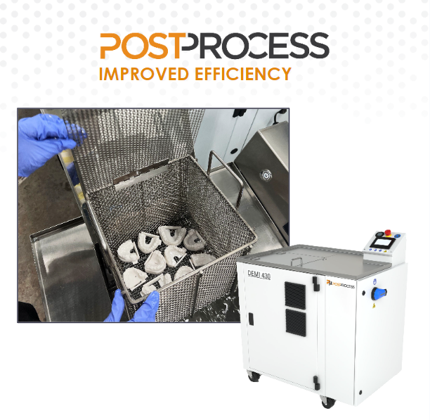 Image shows PostProcess DEMI400 machine with cleaned 3D-printed dental parts 