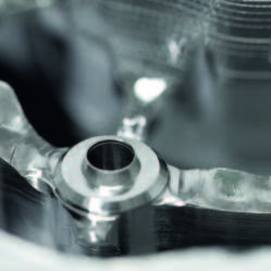 Close-up of a metal bar milled with CORiTEC machine